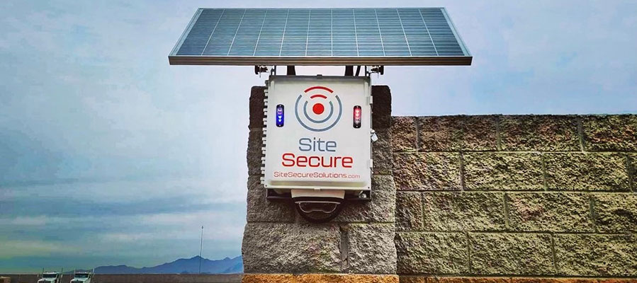 Solar Powered Monitored Securty Camera Mounted on Wall Overlooking Fleet